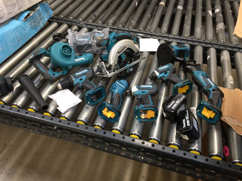 Photo 3 of Makita XT801X1 18V LXT Lithium-Ion Cordless 8-Pc. Combo Kit (3.0Ah)-------98percent of the items are brand new there are some scratches on the skill saw other then that everything is new ----seems like a person used the saw once then returned the item  
