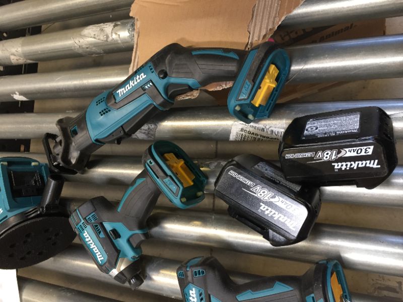 Photo 11 of Makita XT801X1 18V LXT Lithium-Ion Cordless 8-Pc. Combo Kit (3.0Ah)-------98percent of the items are brand new there are some scratches on the skill saw other then that everything is new ----seems like a person used the saw once then returned the item  
