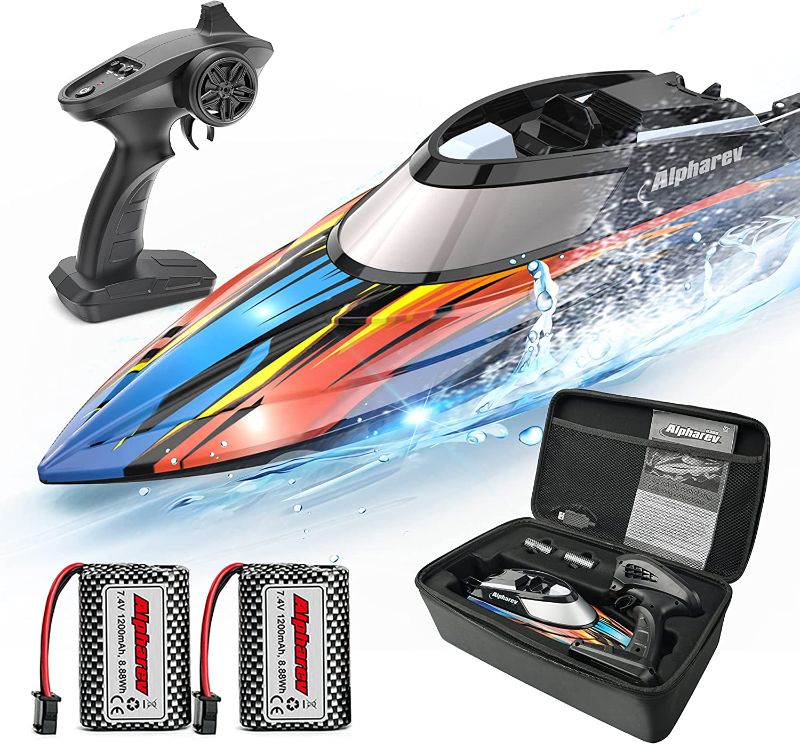 Photo 1 of RC Boat with Case- AlphaRev R308 20+ MPH Fast Remote Control Boat for Pools and Lakes, 2.4 GHZ RC Boats for Adults and Kids------it looks like all the parts are there looks like the boat needs some minor work 

