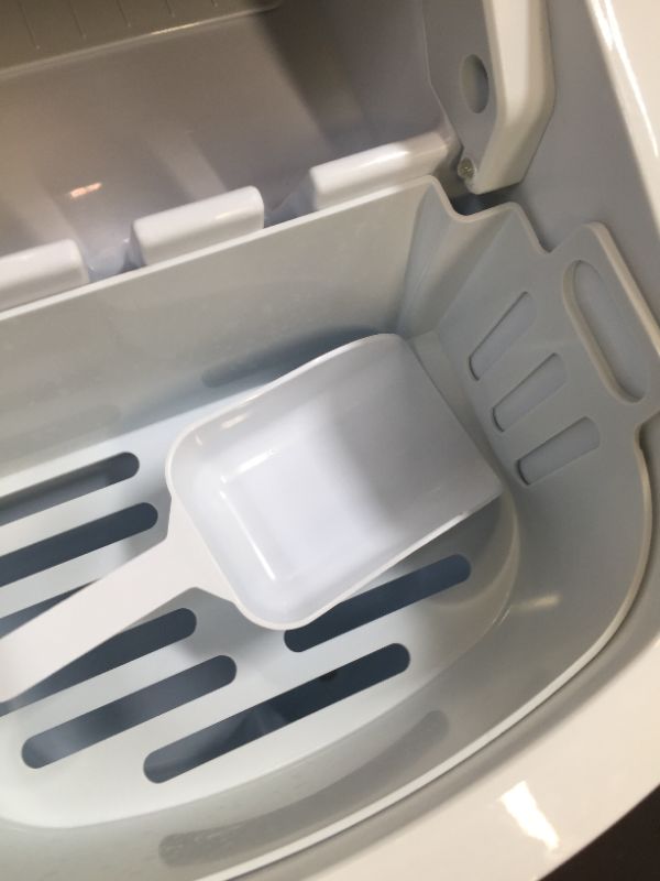 Photo 1 of Frigidaire EFIC189-Silver Compact Ice Maker, 26 lb per Day, Silver & Perfect Stix Icebag10TT-50 Ice Bag with Twist Tie Enclosure, 10 Lbs (50/Pk) (Pack of 50)
