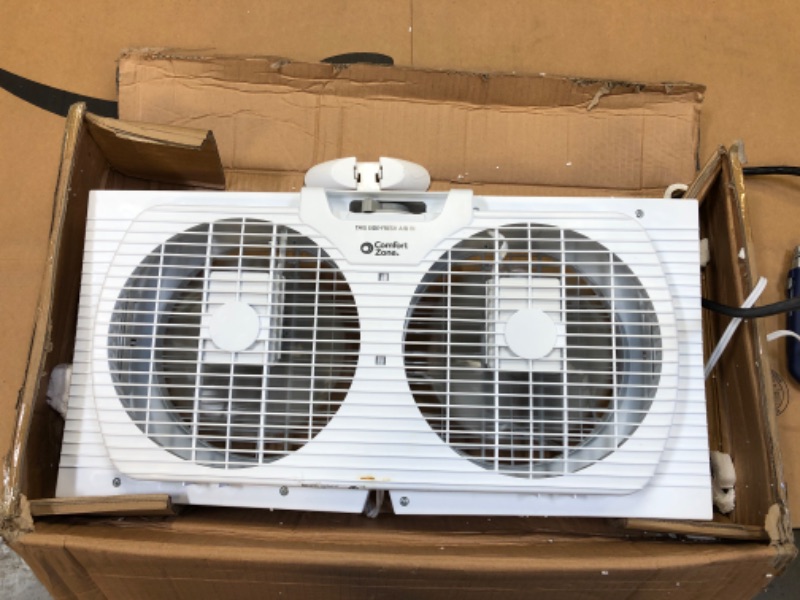Photo 1 of Amazon Basics Window Fan with Manual Controls