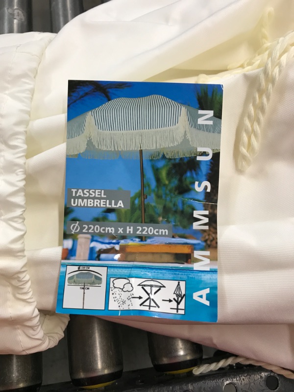 Photo 1 of 
AMMSUN 7ft Patio Umbrella with Fringe Outdoor Tassel Umbrella UPF50+ Wood Color Steel Pole and Steel Ribs Push Button Tilt,White Cream