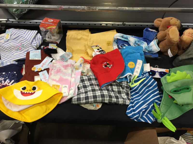 Photo 1 of BAG LOT OF KIDS CLOTHING AND MISC. ITEMS - DIFFERENT STYLES ANS SIZES --SOLD AS IS ---