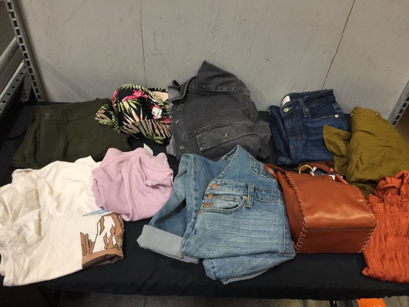 Photo 1 of BAG LOT OF 10 WOMEN CLOTHING ITEMS --DIFFERENT STYLES AND SIZES --SOLD AS IS ---