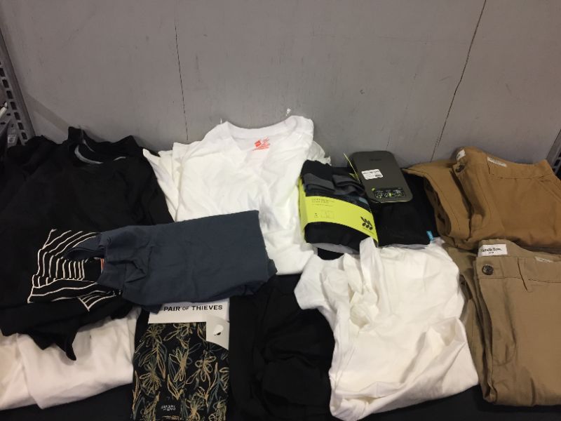 Photo 1 of BAG LOT OF MEN CLOTHES - DIFFERENT STYLES AND SIZES --SOLD AS IS ---