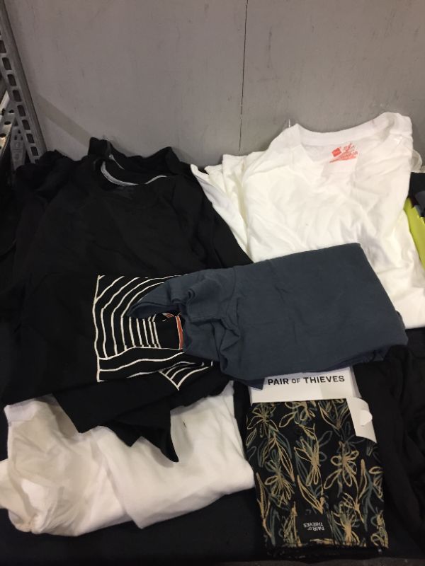 Photo 1 of BAG LOT OF MEN CLOTHES - DIFFERENT STYLES AND SIZES --SOLD AS IS ---