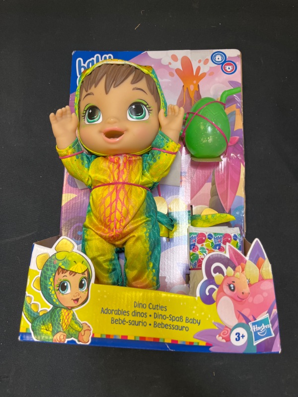 Photo 2 of Baby Alive Dino Cuties Doll Stegosaurus Doll Drinks & Wets Brown Hair
