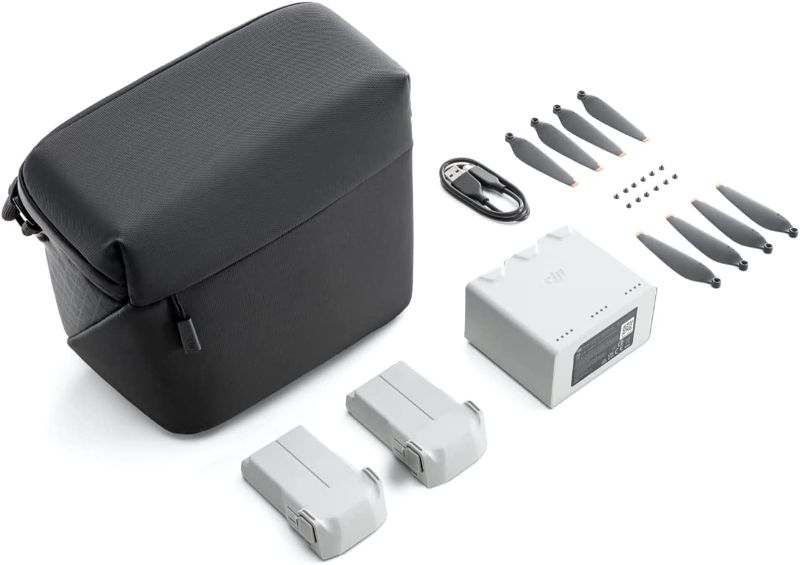 Photo 1 of DJI Mini 3 Pro Fly More Kit Plus, Includes Two Intelligent Flight Batteries Plus, a Two-Way Charging Hub, Data Cable, Shoulder Bag, Spare propellers, and Screws