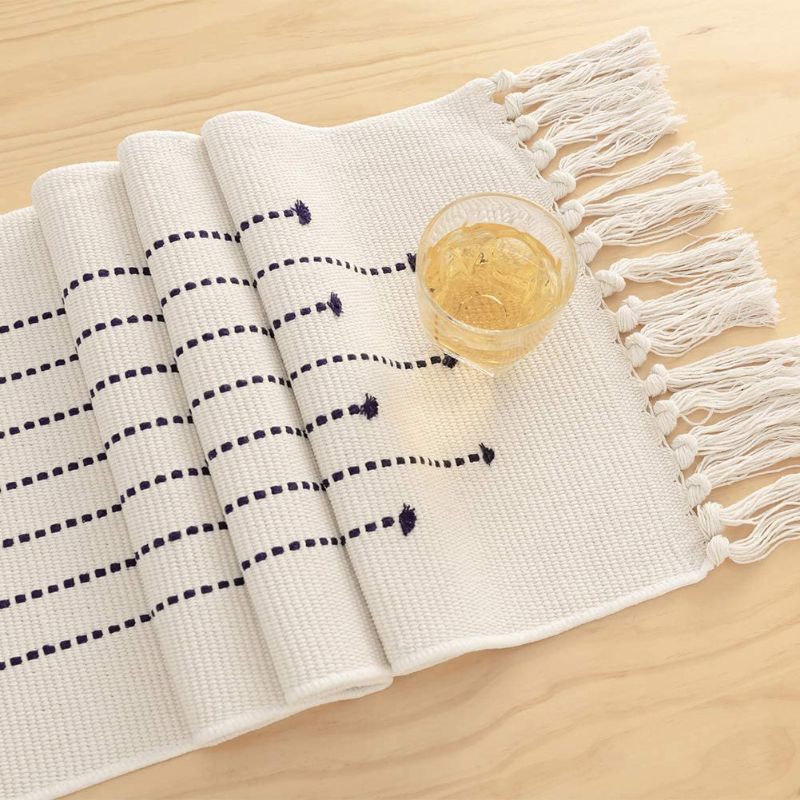 Photo 1 of ALIBALA Boho Table Runner, Long Farmhouse Table Runner with Macrame Tassels Cotton and Linen Coffee Table Runner Rustic Style for Living Room Dining Kitchen Decor, Navy Blue 13"x102"