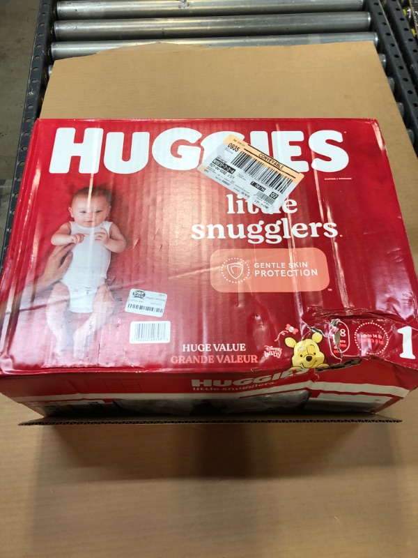 Photo 2 of ****MINOR DAMAGE TO PACKAGING**** Huggies Little Snugglers Diapers Huge Pack - Size 1 (168ct)	