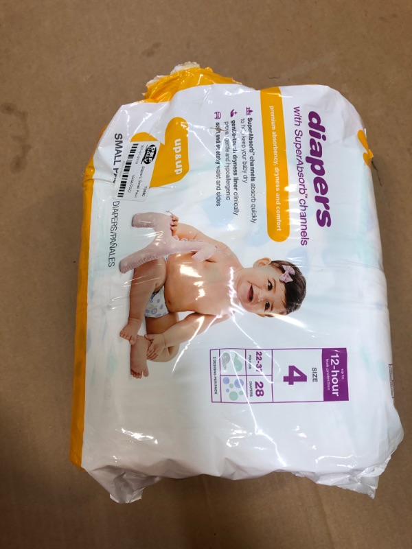 Photo 3 of ***MINOR DAMAGE TO PACKAGING****Diapers Small Pack - Size 4 - 28ct - Up & Up