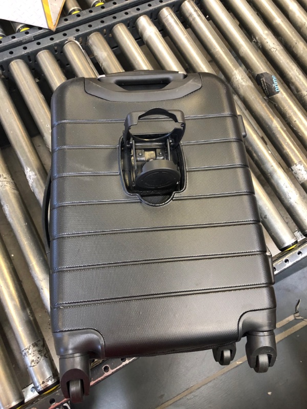 Photo 1 of Wrangler 20" Smart Spinner Carry-On Luggage with USB Charging Port
