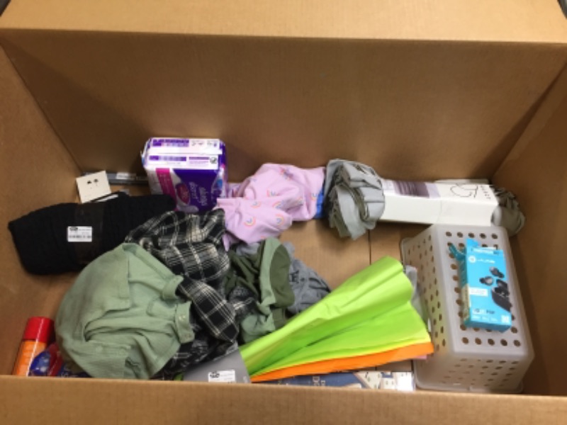 Photo 1 of A Random Item Bundle Box including---- Clothes, Dominoes, Grey Curtains, Headphones, and ETC 