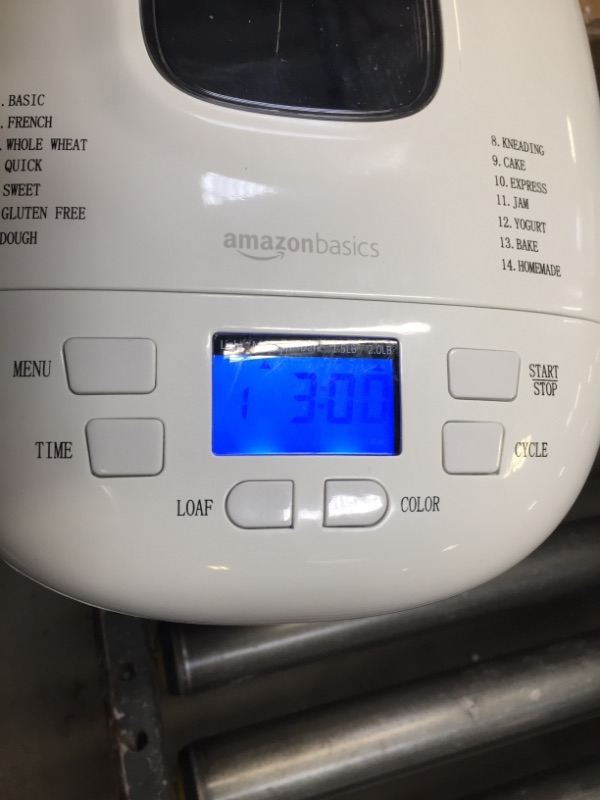 Photo 2 of Amazon Basics 2 Pound Non-Stick Bread Making Machine, White---------used needs cleaning-----metal is rusted due to usage 
