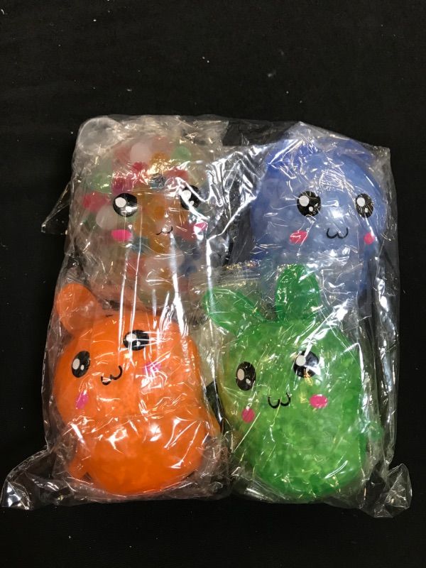 Photo 2 of 4 Pack Bunny Squishy Stress Balls Toy for Kids,Rabbit Sensory Balls Relief Hand Fidget Filled with Water Beads to Relax,Halloween&Christmas Toys for Party Favor Gifts for Girls,Easter Basket Stuffers
