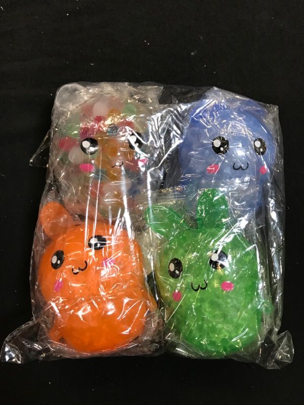 Photo 1 of 4 Pack Bunny Squishy Stress Balls Toy for Kids,Rabbit Sensory Balls Relief Hand Fidget Filled with Water Beads to Relax,Halloween&Christmas Toys for Party Favor Gifts for Girls,Easter Basket Stuffers
