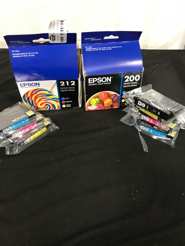 Photo 1 of Epson 200/212  Ink Cartridges - Cyan Magenta Yellow black 
{2pack}{open box}


