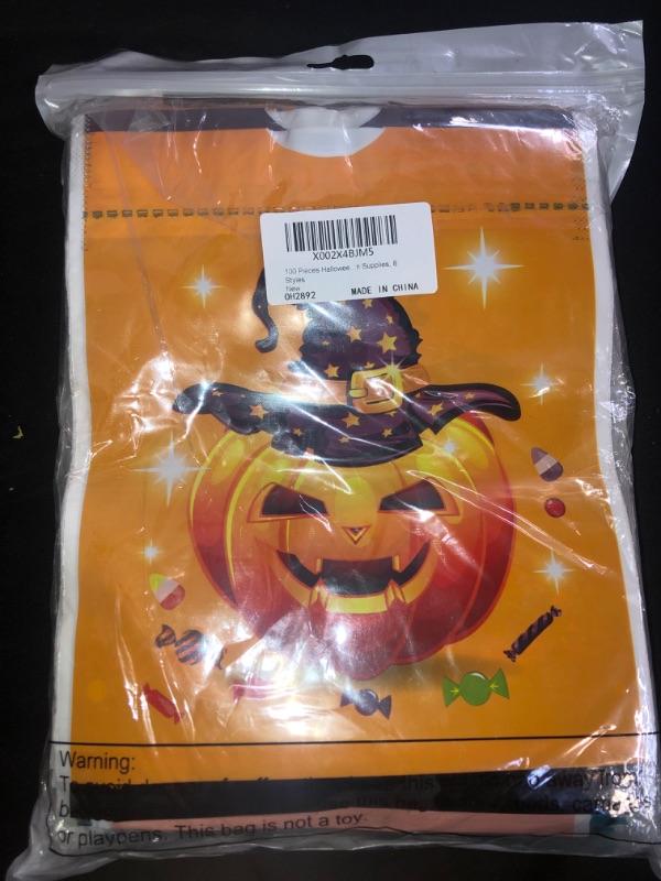 Photo 2 of 100 Pieces Halloween Plastic Bags Candy Bags Trick or Treat Bags Jack O Lantern Pumpkin Treat Bags Goody Bags Party Favor Bags with Pumpkin Ghost Designs for Halloween Party Favor