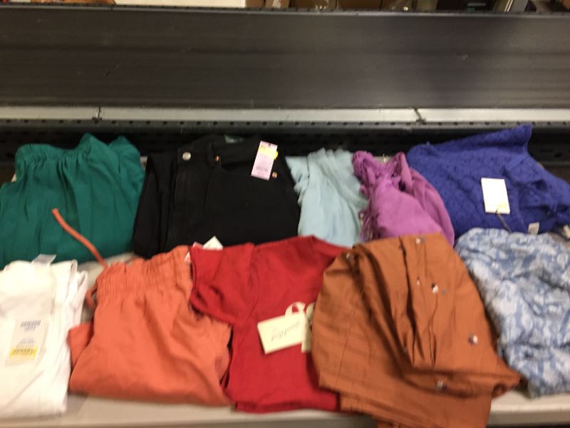 Photo 1 of BAG LOT OF 10 WOMEN CLOTHING ITEMS - DIFFERENT STYLES AND SIZES ---SOLD AS IS ---