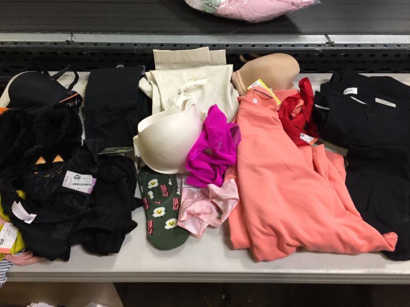 Photo 1 of BAG LOT OF WOMEN CLOTHING DIFFERENT STYLES AND SIZES --SOLD AS IS ---