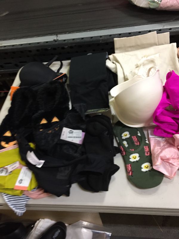 Photo 3 of BAG LOT OF WOMEN CLOTHING DIFFERENT STYLES AND SIZES --SOLD AS IS ---