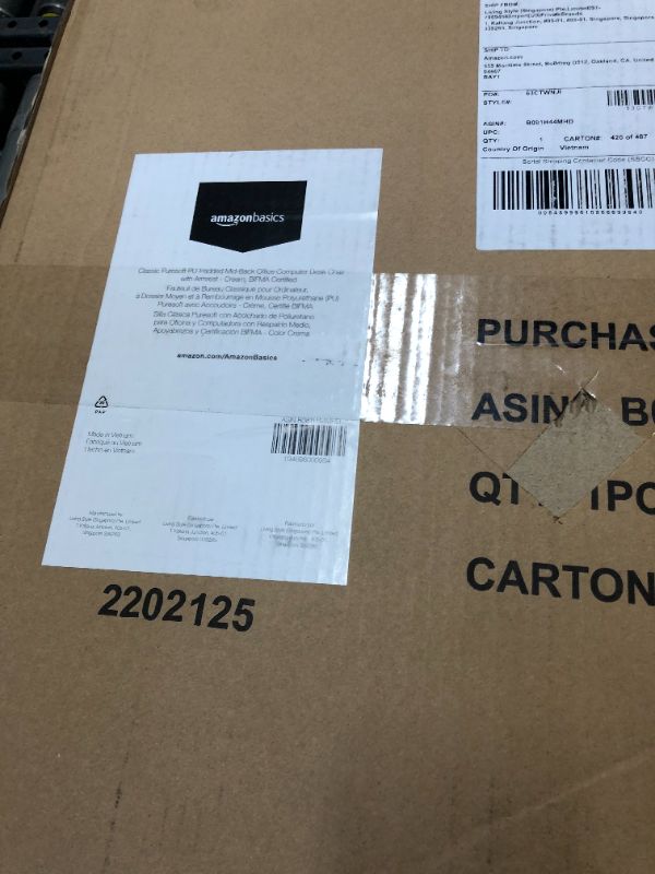 Photo 1 of Amazon Basics Classic Puresoft Padded Mid-Back Office Computer Desk Chair with Armrest - Cream