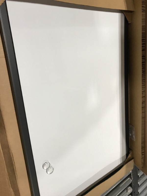 Photo 2 of Amazon Basics Magnetic Dry Erase White Board, 35 x 23-Inch Whiteboard - Black Wooden Frame 23"x35" Magnetic, Wood Frame