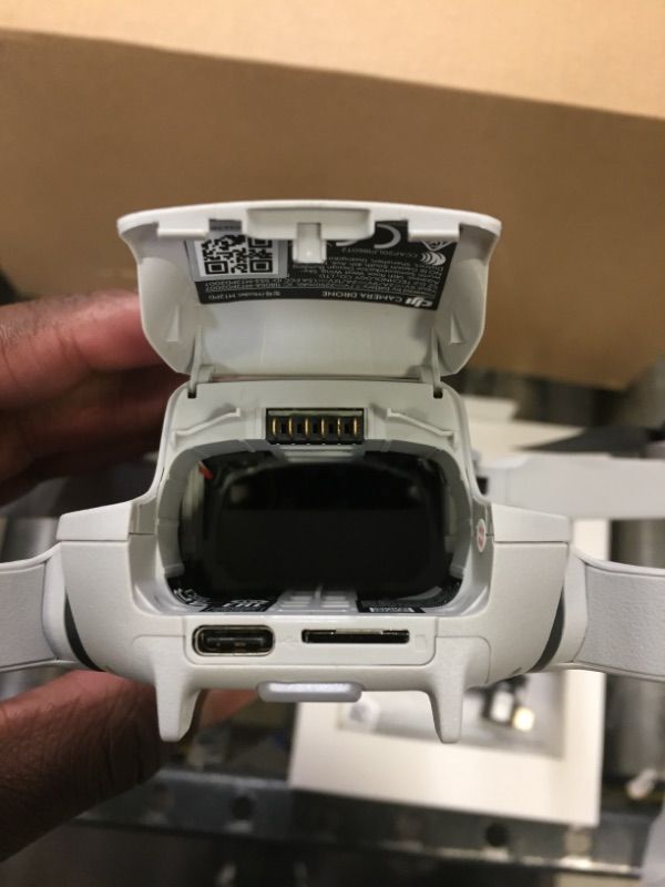 Photo 11 of - - -- PARTS ONLY -- - -- DJI Mini 2 Quadcopter with Remote Controller
- missing battery!