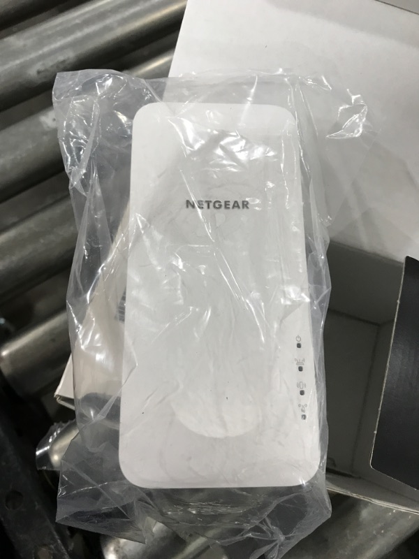 Photo 2 of NETGEAR WiFi 6 Mesh Range Extender (EAX15) - Add up to 1,500 sq. ft. and 20+ Devices with AX1800 Dual-Band Wireless Signal Booster & Repeater (up to 1.8Gbps Speed), WPA3 Security, Smart Roaming 1.8 Gbps, WiFi 6 | Wallplug