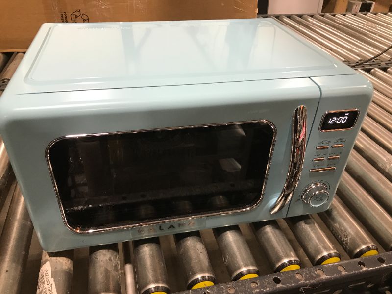 Photo 1 of Galanz 1.1 Cu. Ft. Retro Countertop Microwave in Blue
