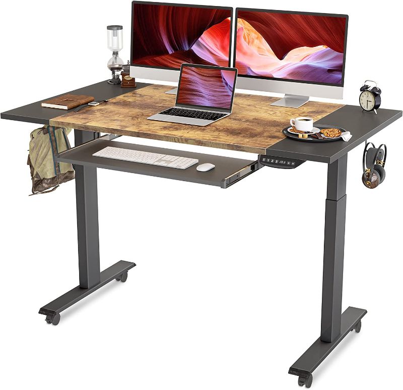 Photo 1 of FEZIBO 55 x 24 Inch Dual Motor Height Adjustable Electric Standing Desk with Keyboard Tray, Sit Stand Table with Splice Board, Black Frame/Black and Rustic Brown Top
