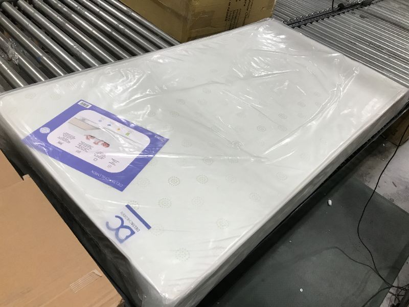 Photo 1 of Delta Children Twinkle Galaxy Dual Sided Crib and Toddler Mattress - Premium Sustainably Sourced Fiber Core - Waterproof - GREENGUARD Gold Certified (Non-Toxic) - Made in USA