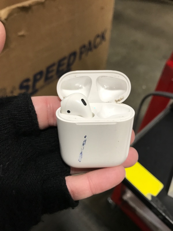 Photo 2 of Apple AirPods with Charging Case (Latest Model)