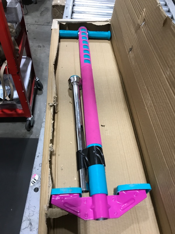 Photo 2 of Flybar Limited Edition Foam Maverick Pogo Stick for Boys & Girls | Indoor/Outdoor Toy for Kids Ages 5-9 | Features New 'Rubber' Grip Handles | Non-Slip Foot Pegs for Safety | Pink Teal