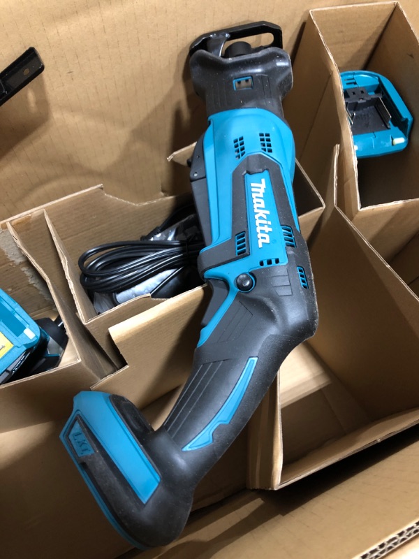 Photo 6 of "Makita XT510SM 18V LXT Li-Ion Cordless 5 Tool Combo Kit W/ 4.0Ah Battery". OPEN BOX. PRIOR USE. MISSING ITEMS. 
