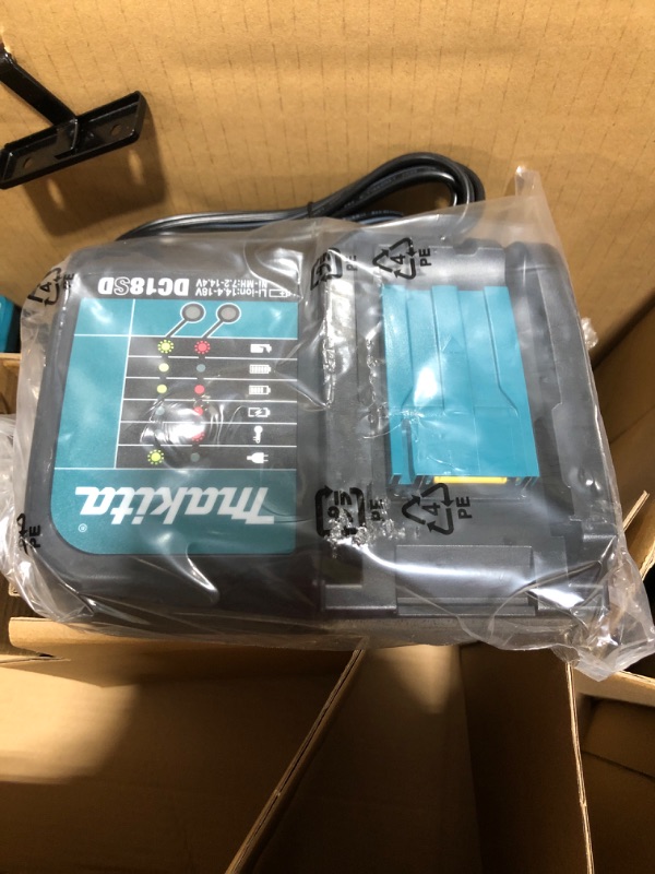 Photo 1 of "Makita XT510SM 18V LXT Li-Ion Cordless 5 Tool Combo Kit W/ 4.0Ah Battery". OPEN BOX. PRIOR USE. MISSING ITEMS. 

