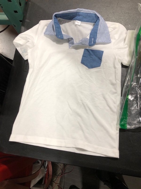 Photo 1 of BOYS POLO SHIRT, unknown size.