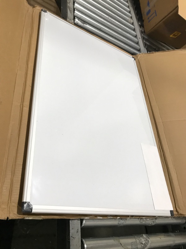 Photo 2 of Amazon Basics Magnetic Dry Erase White Board, 36 x 24-Inch Whiteboard - Silver Aluminum Frame 24" x 36" Magnetic, Aluminum Frame