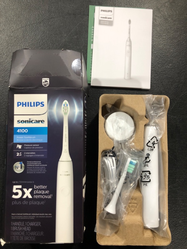 Photo 2 of Philips Sonicare 4100 Power Toothbrush, Rechargeable Electric Toothbrush with Pressure Sensor, White HX3681/23 White New 4100