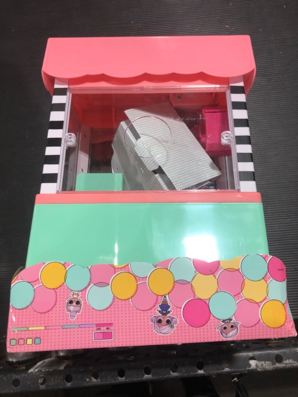 Photo 3 of L.O.L. Surprise! Minis Claw Machine Playset with 5 Surprises with Lights & Exclusive LOL Mini Family, Holiday Toy Great Gift for Kids Girls Boys Ages 4 5 6+ Years Old & Collectors