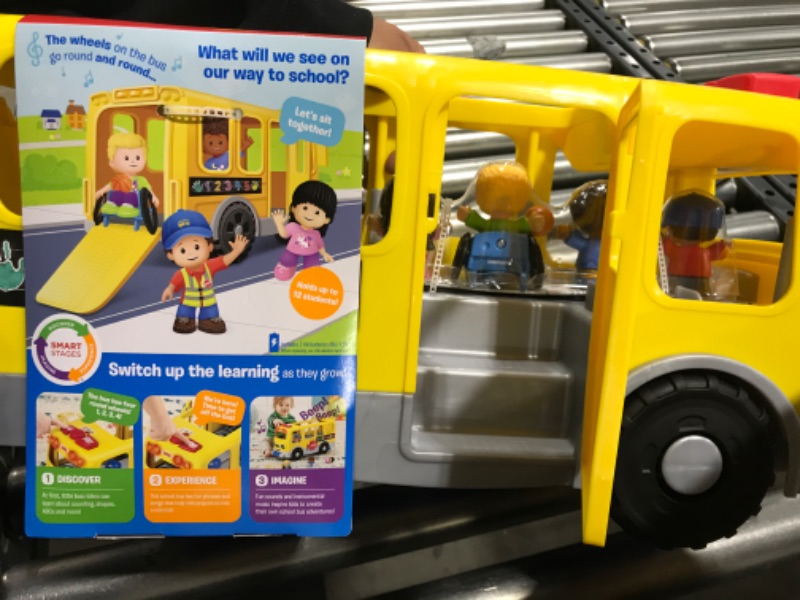 Photo 2 of Fisher-Price Little People Toddler School Bus Push Toy with Lights Sounds and Smart Stages Learning Content, 4 Toy Figures? Big Yellow School Bus