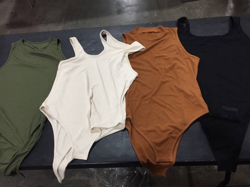 Photo 1 of 4 TANK TOPS 1 PC CONNECT AT THE BOTTOM BLOUSES