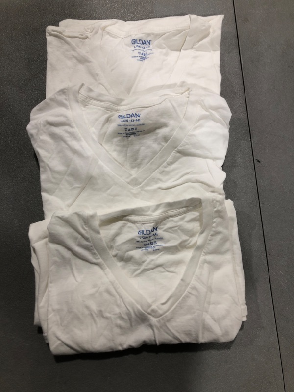 Photo 1 of 3 PACK WHITE V NECK 
SIZE LARGE 