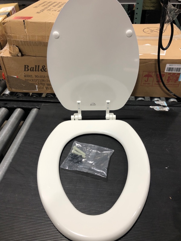 Photo 2 of BEMIS 1400TTA 000 Economy Toilet Seat, ELONGATED, Durable Enameled Wood, White 1 Pack Elongated