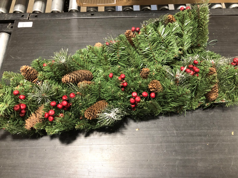 Photo 1 of 9 ft. Crestwood Spruce Garland with Battery Operated Warm White LED Lights