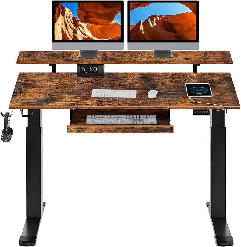 Photo 1 of Rolanstar Standing Desk Dual Motor with USB Charging Ports, 47" Adjustable Height Desk with Keyboard Tray and Monitor Shelf- Bamboo Color