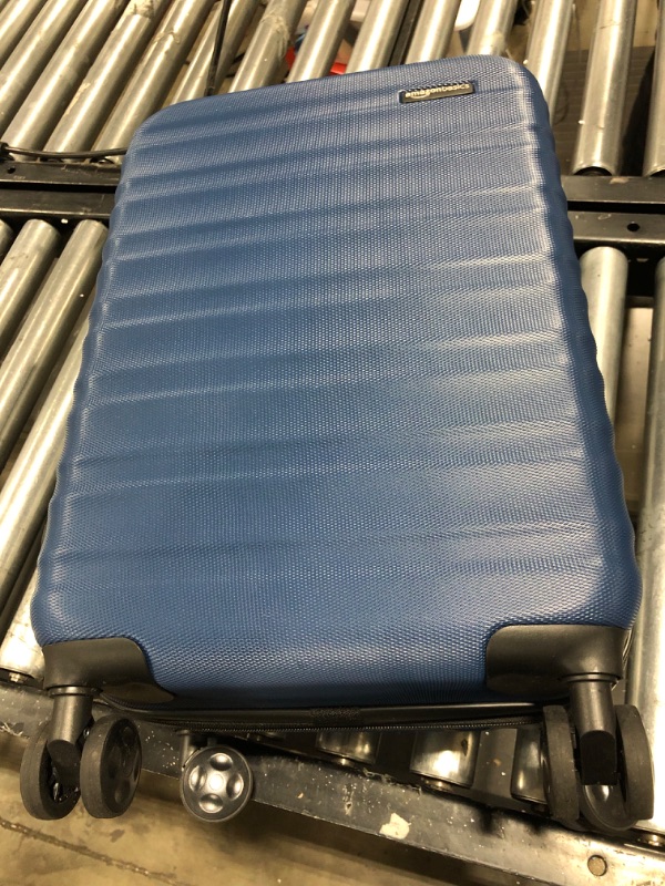 Photo 1 of Amazon Basics 26-Inch Hardside Spinner, Navy Blue
