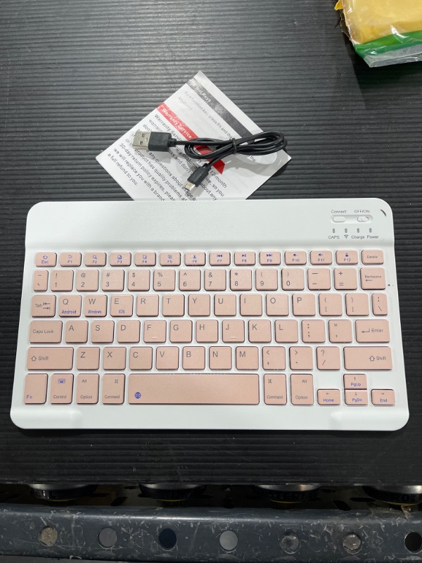 Photo 2 of Ultra-Slim Bluetooth Keyboard Portable Mini Wireless Keyboard Rechargeable for Apple iPad iPhone Samsung Tablet Phone Smartphone iOS Android Windows (10 inch Pink)
