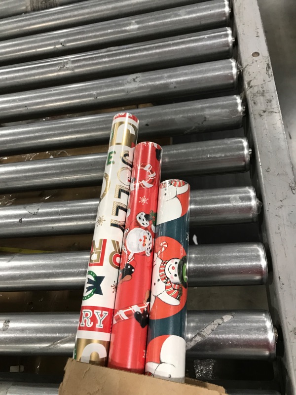 Photo 2 of 
Hallmark Vintage Christmas Wrapping Paper Cut Lines on Reverse (3 Rolls: 120 sq. ft. ttl, Red, White, Navy Blue) Funny Candy Cane Santas, Classic Snowman, "Merry, Jolly,