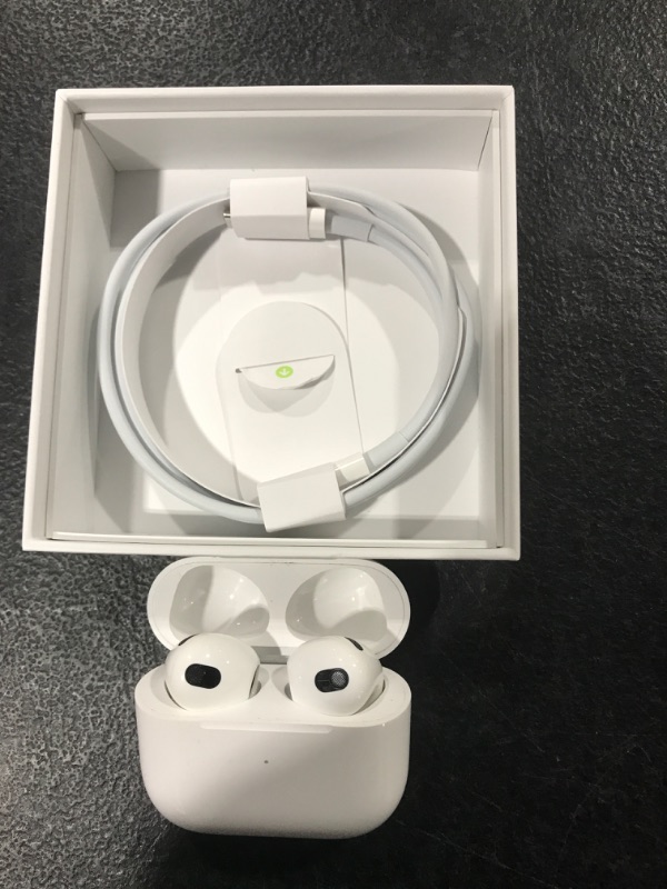 Photo 2 of Apple AirPods (3rd Generation) Wireless Earbuds with MagSafe Charging Case. Spatial Audio, Sweat and Water Resistant, Up to 30 Hours of Battery Life. Bluetooth Headphones for iPhone